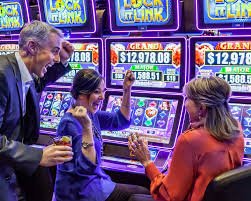 Live baccarat table view on mobile phone showing dealer, cards, and bet buttons
